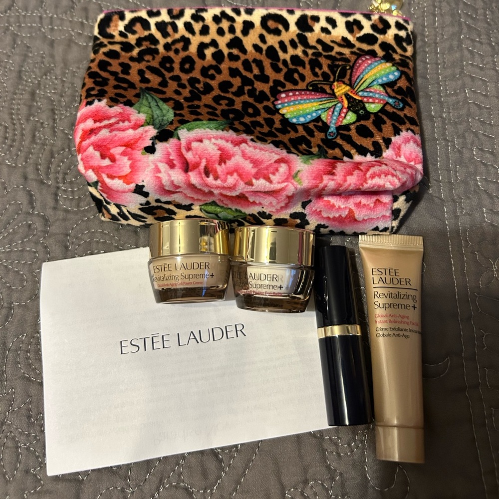 ESTEE LAUDER 4pc Cosmetic Makeup Cheetah Bag
Brand New